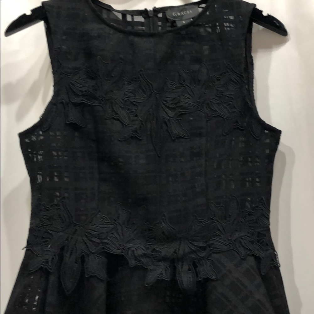 Black lace appliqué peplum top